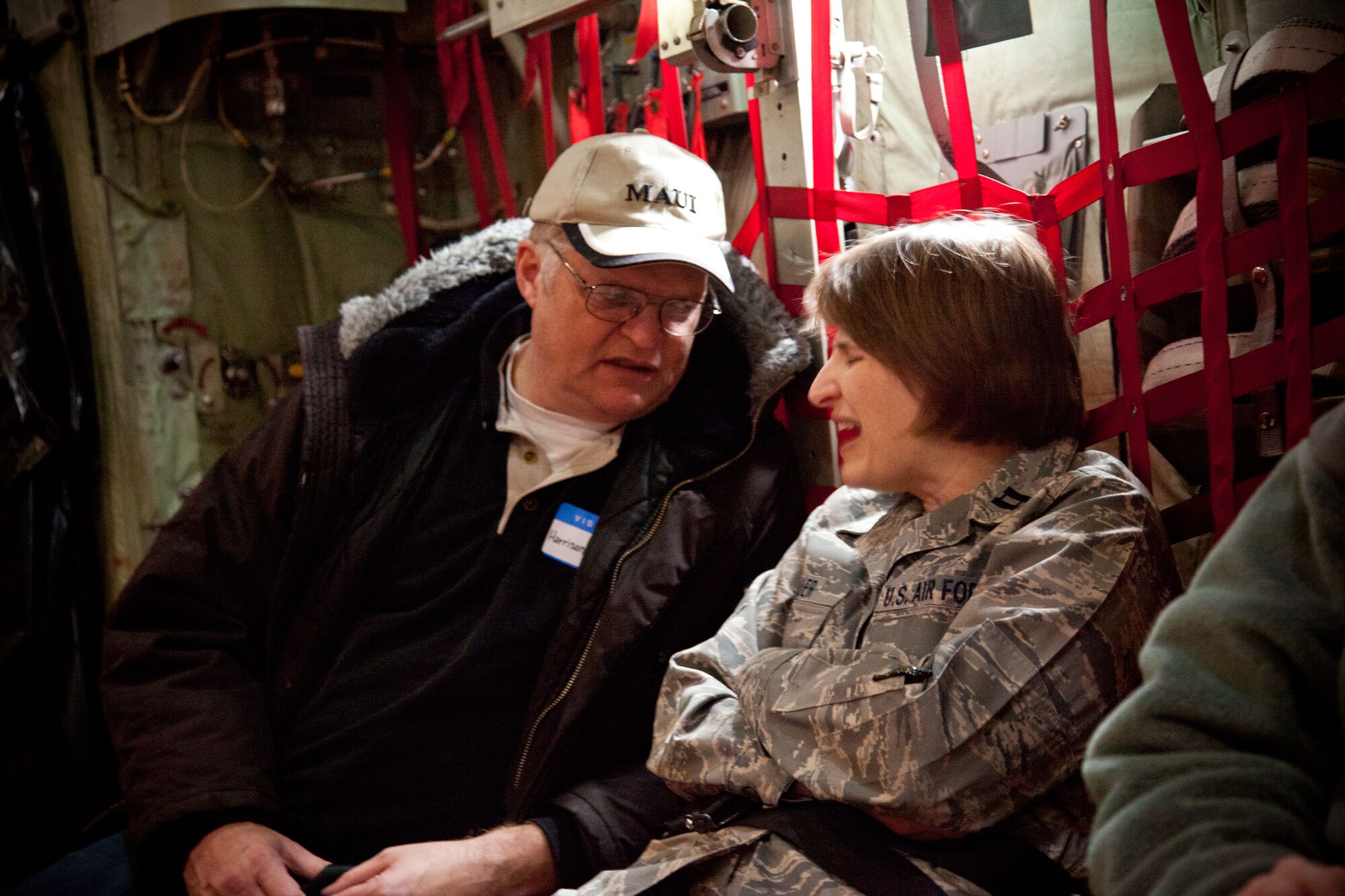 Harrison Newhouse talks with Chaplain (Capt.) Tara Bauer during the  Clergy Day flight Oct. 28.(Air Force Photo/Shannon McKay)