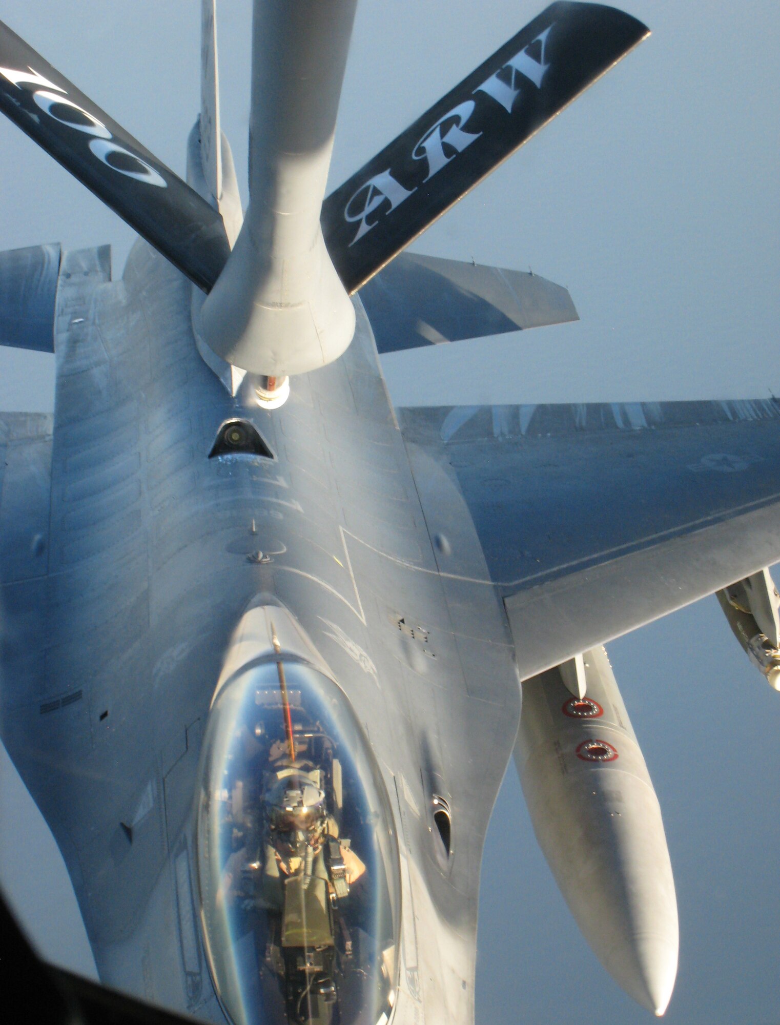 A KC-135 Stratotanker, deployed to the 313th Air Expeditionary Wing in the European theater of operations, refuels a U.S. Air Force F-16 over the Mediterranean Sea on the final mission day of flying during Operation Unified Protector on Oct. 31, 2011. The United Nations' mandated mission lead to a coalition of 28 countries and the enforcement of a no-fly zone and maritime embargo to protect the citizens of Libya. The 313th AEW brought together a Total Force Airmen who delivered more than 24 million gallons of fuel during the operation. (U.S. Air Force Photo/Maj. Andra Higgs)
