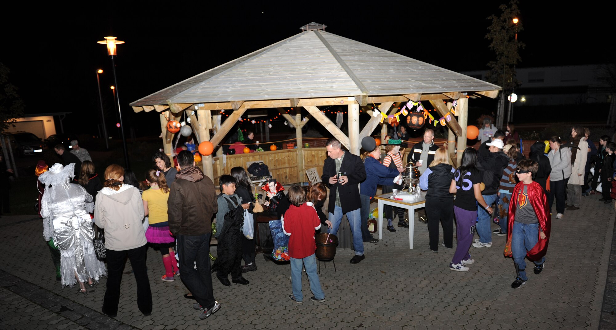 SPANGDAHLEM AIR BASE, Germany – Families trick-or-treat in base housing during Halloween here Oct. 31. Trick-or-treating was held on base for Airmen and their families so they could enjoy the U.S. holiday. (U.S. Air Force photo/Senior Airman Christopher Toon)