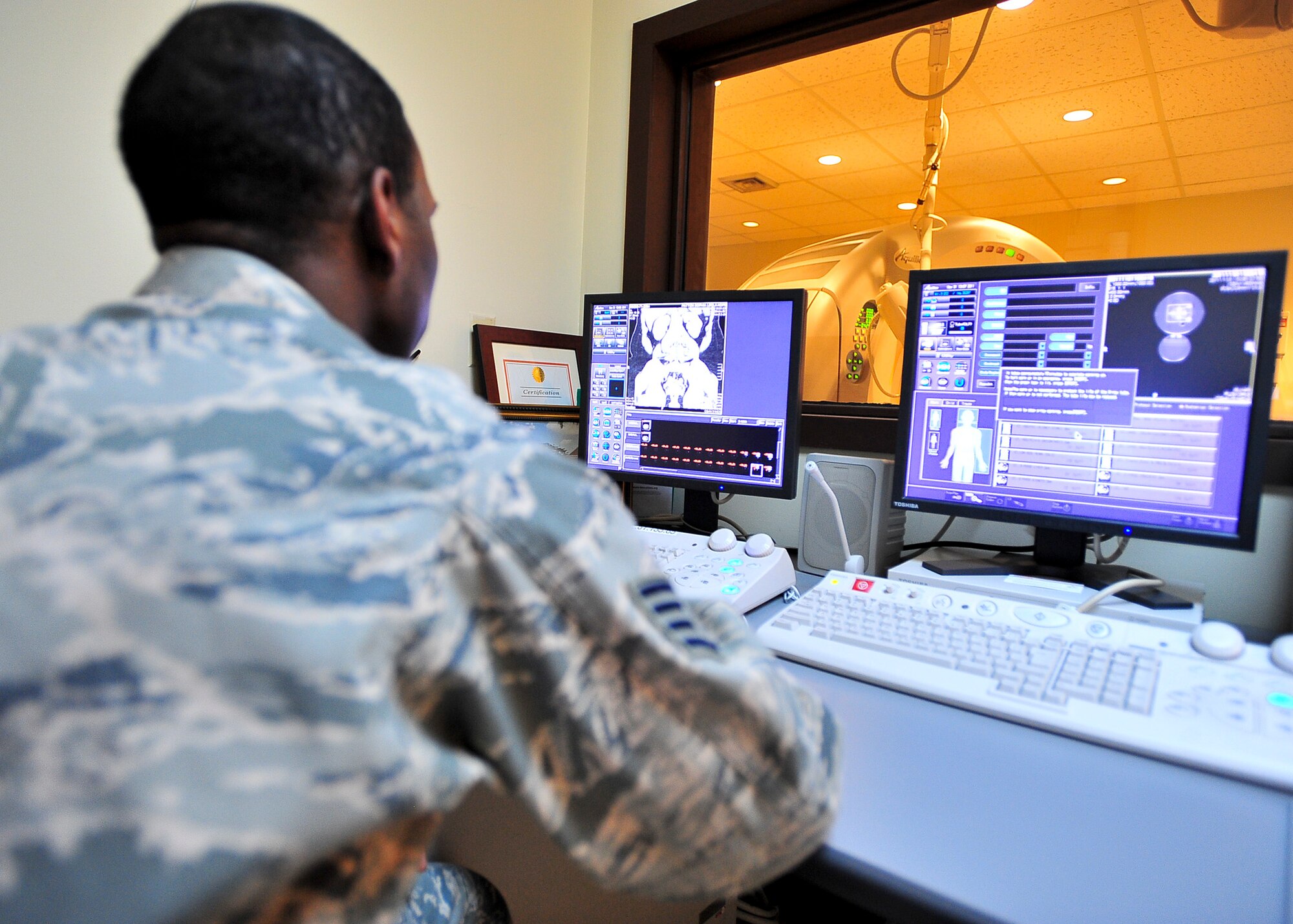 Staff Sgt.  Kevin Collymore, 51st Medical Operations Squadron radiology technician, analyzes patient’s results Nov. 1, 2011. The results once analyzed will be forwarded to the Radiologist who will then make a proper diagnose on the patient. (U.S. Air Force photo/Senior Airman Adam Grant)