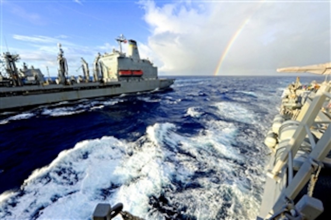 The Military Sealift Command fleet replenishment oiler USNS Walter S. Diehl transits alongside the guided-missile destroyer USS Wayne E. Meyer during a replenishment at sea in the Pacific Ocean, Nov. 1, 2011. The Wayne E. Meyer is deployed to the U.S. 7th Fleet area of responsibility conducting maritime security operations.