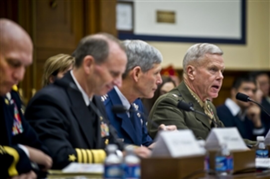 Marine Corps Commandant Gen. James F. Amos testifies before the House Armed Services Committee along with Army Chief of Staff Gen. Raymond T. Odierno, Chief of Naval Operations Adm. Jonathan W. Greenert  and Air Force Chief of Staff Gen. Norton A. Schwartz in Washington, D.C., Nov. 2, 2011.