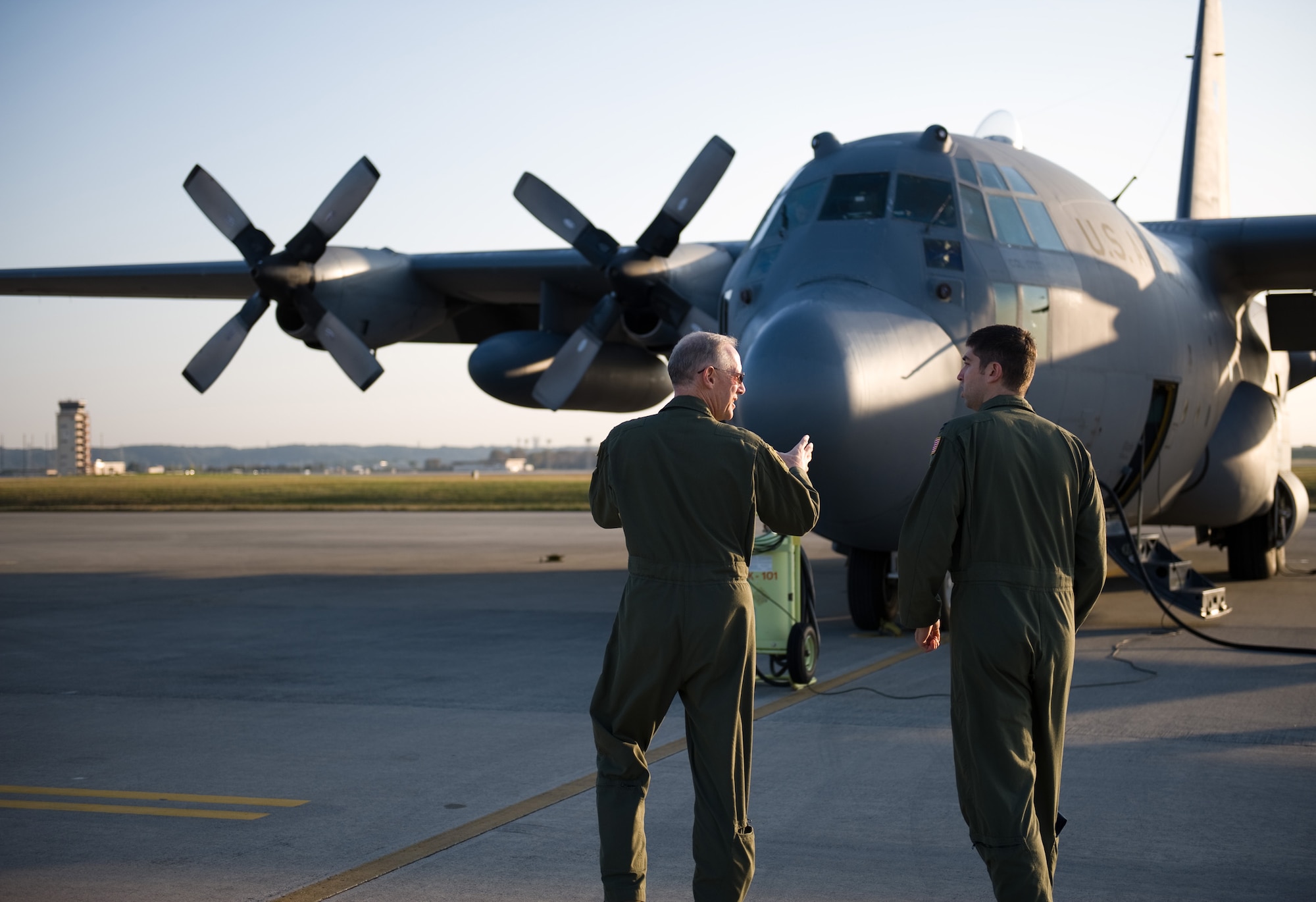 YOKOTA AIR BASE, Japan -- Col. Otto Feather, 374th Airlift Wing commander, performs a pre-flight inspection of a C-130 Hercules with Capt. Dereck Monnier, 36th Airlift Squadron C-130 Hercules pilot, at Yokota Air Base, Japan, Nov. 2, 2011. (U.S. Air Force photo/Airman 1st Class Krystal M. Garrett) 