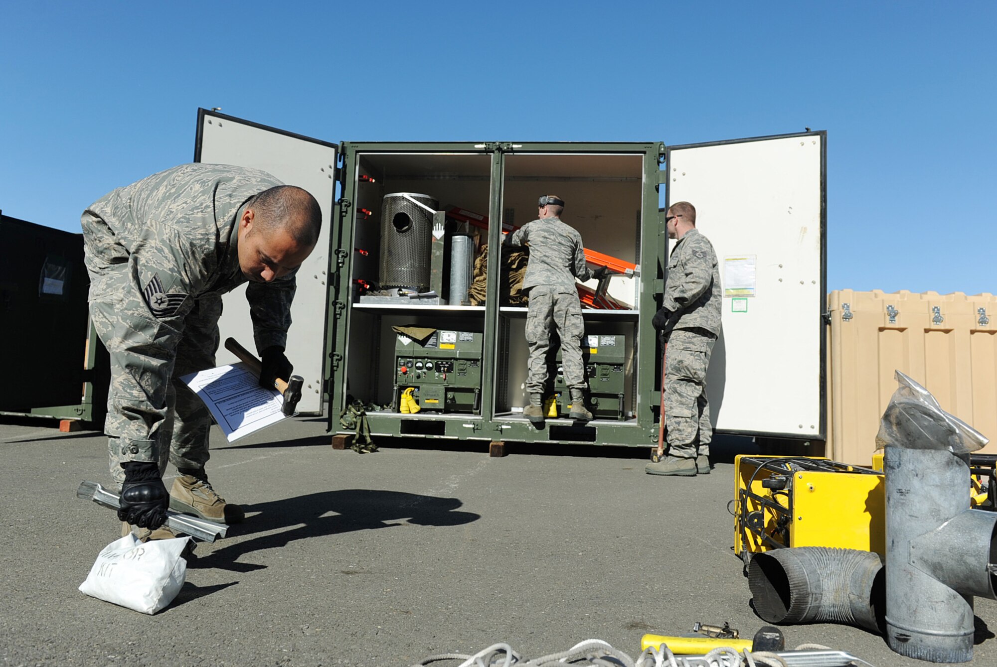 615th Contingency Response Wing warriors ensure accuracy of equipment accountability during the reconstitution phase during the 60th Air Mobility Wing conducted staff assistance visit for the upcoming Logistics Compliance Assessment Program. (U.S. Air Force photo/ Master Sgt. Stan Parker)