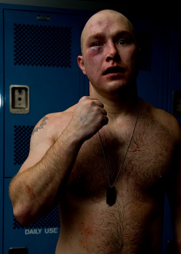 Turner poses for photo after winning. Although this was Turner’s second fight, hard work and determination lead him to a well earned victory. (U.S. Air Force photo by Airman 1st Class Kate Thornton/Released)