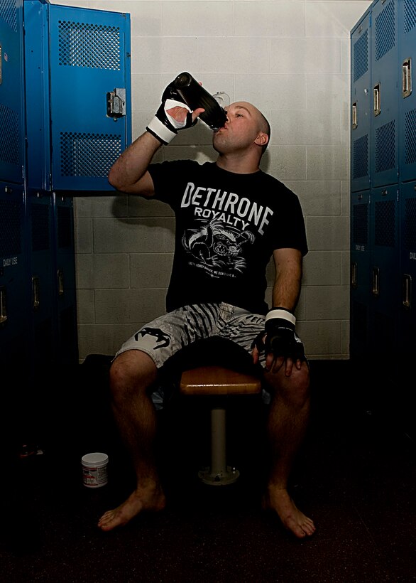 Turner drinks a pre-workout supplement which he believes provides him with energy and focus during his upcoming fight. (U.S. Air Force photo by Airman 1st Class Kate Thornton/Released)