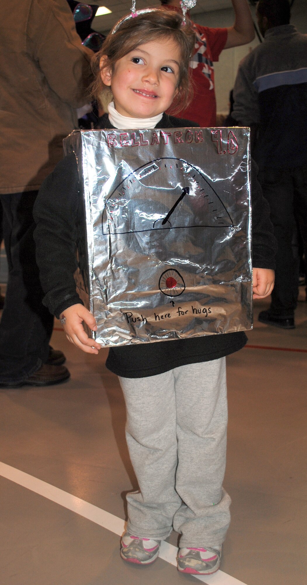 Isabella DiLorenzo, 4, is all smiles in her robot costume. (U.S. Air Force photo/Airman 1st Class Katrina Heikkinen)