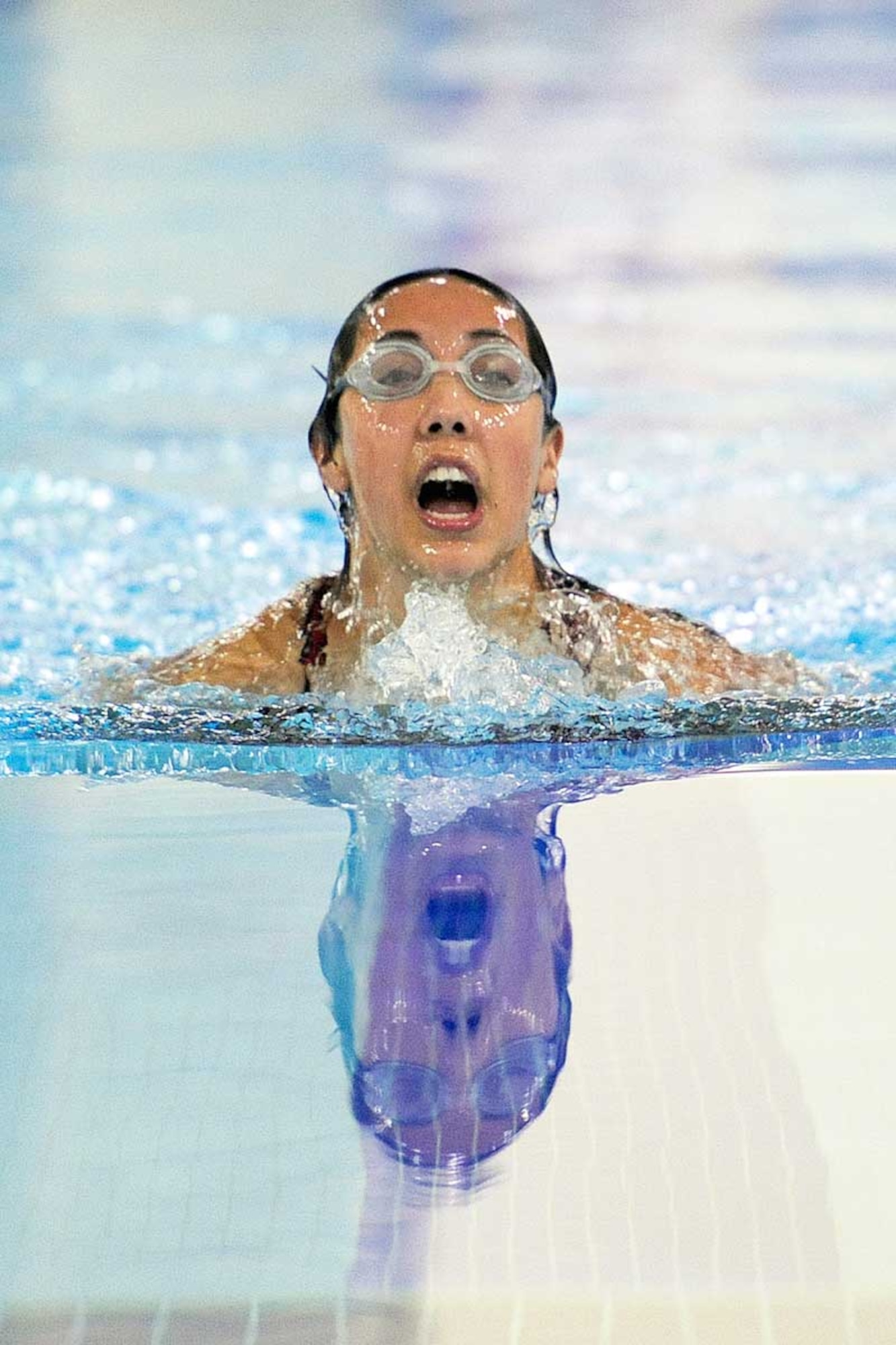 Becca Powell, swimming for the 673d FSS team, competes in the 50-yard breast stroke Oct. 27 at the Buckner Physical Fitness Center pool. Powell finished first in the event with a time of 1:01. (U.S. Air Force photo/John Pennell)