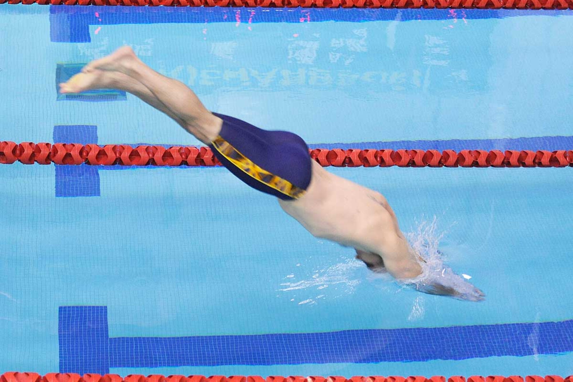 Lee Daniels, swimming for the 673d FSS team, dives in to start the men’s 200-yard individual medley during the JBER swim meet Oct. 27 at the Buckner Physical Fitness Center pool. Daniels finished second in the event with a time of 2:53. (U.S. Air Force photo/John Pennell)