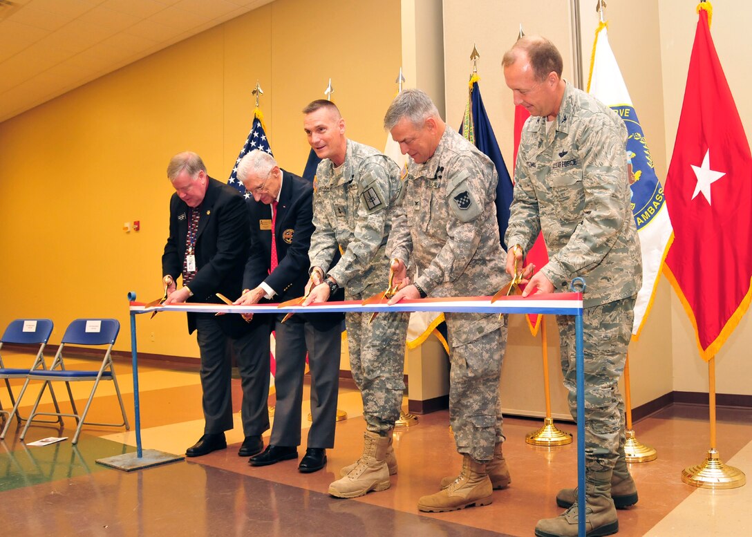 14th District Niagara County Legislator David E. Godfrey, U.S. Army Ambassador Norbert J. Rappl, Adjutant General of New York Maj. Gen. Patrick A. Murphy, Command Inspector General 99th Regional Support Command Col. Andrew A.R. Burns, and 914th Airlift Wing Commander Allan L. Swartzmiller open the Niagara Falls Armed Forces Reserve Center during a ribbon cutting ceremony November 3, 2011, Niagara Falls Air Reserve Station, NY. It is estimated that 600 Army Reserve and New York National Guard personnel will utilize the new complex on rotating schedules. (U.S. Air Force photo by Staff Sgt. Joseph McKee)