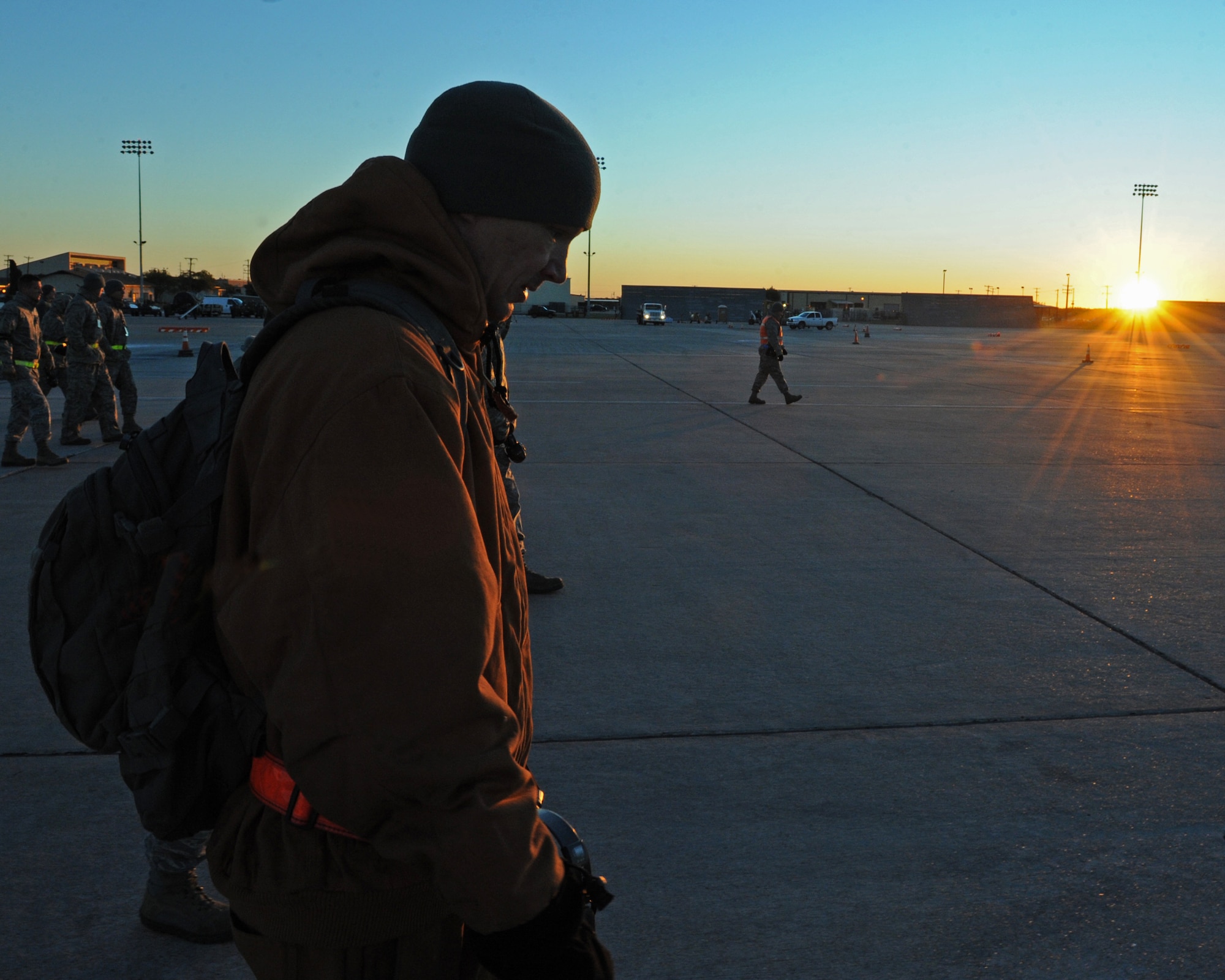 Staff Sgt. Alex Speener, 7th Equipment Maintenance Squadron, participates in a Foreign Object Debris walk Nov. 3, 2011, at Dyess Air Force Base, Texas. Examples of FOD are aircraft parts, rocks, broken pavement, ramp equipment, tools, bolts and vehicle parts. (U.S. Air Force photo by Airman 1st Class Peter Thompson/Released)