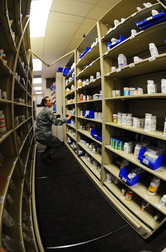 Staff Sgt. Amber Lloyd, 28th Medical Support Squadron medical logistics technician, scans medications at the pharmacy on Ellsworth Air Force Base, S.D., Oct. 25, 2011. The shelves are stocked and inventoried to keep the pharmacy supplied for all of Ellsworth’s patients. (U.S. Air Force photo by Airman 1st Class Zachary Hada/Released)