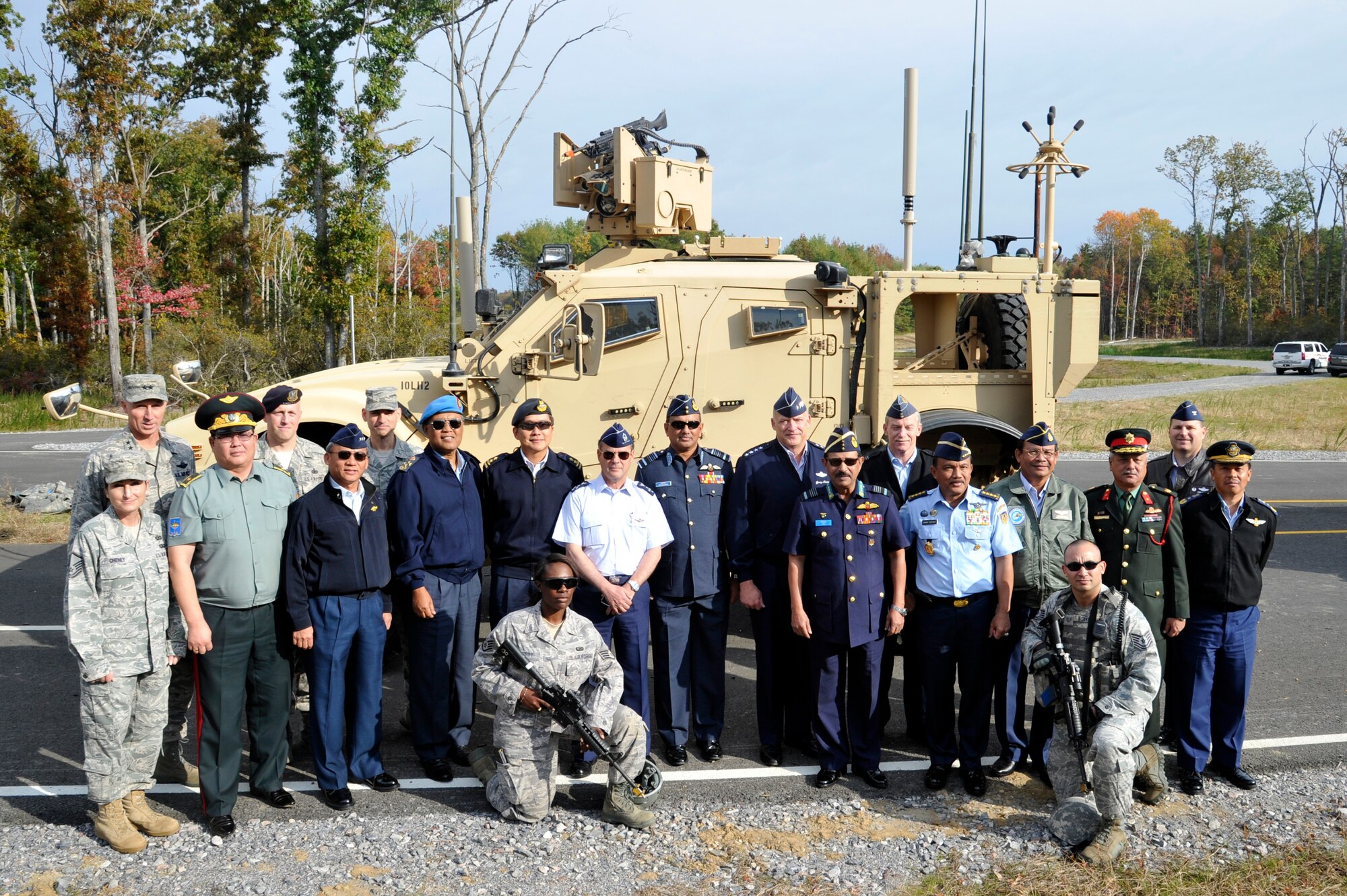 Maj. Gen. William J. Bender, U.S. Air Force Expeditionary Center commander, and members of the EC staff pose for a photo with Air Chiefs from countries in the Pacific region during a visit to Joint Base McGuire-Dix-Lakehurst, N.J. Oct. 26.  The Air Chiefs toured several Air Force bases during their weeklong trip to the U.S.  During their stop at JB MDL, the Air Chief's also witnessed contingency response operations by the 621st Contingency Response Wing, C-17 capabilities demonstration by the 305th Air Mobility Wing and an aeromedical evacuation presentation by the 514th Air Mobility Wing.  (U.S. Air Force photo by Master Sgt. Laura K. Deckman)(released)