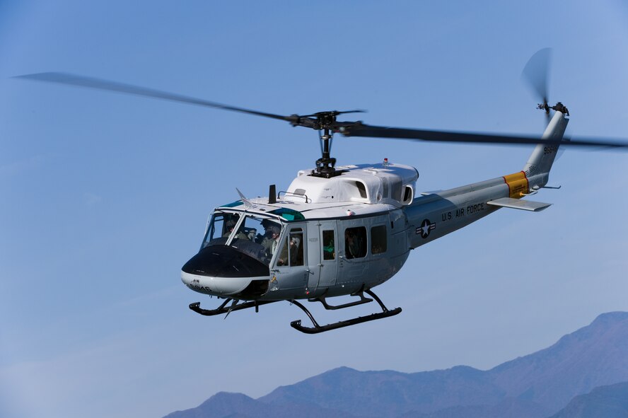 OVER JAPAN -- A UN-H1 Huey flies in the Kanto Plains region Nov. 2, 2011, from Yokota Air Base, Japan. The aircraft flew in an exercise known as the Samurai Surge, a day dedicated to practicing aerial formations and other aircraft maneuvers. (U.S. Air Force photo/Osakabe Yasuo)  