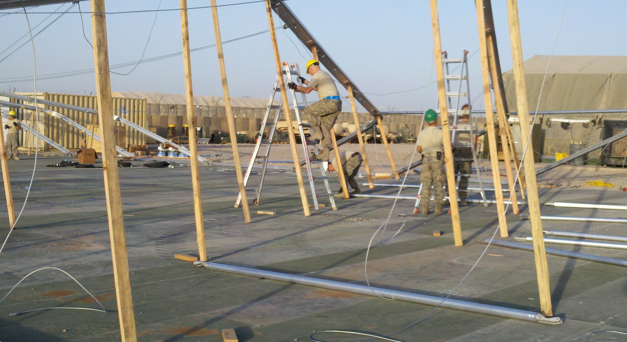 Basic Expeditionary Airfield Resources Base team Airmen from the 49th Material Maintenance Group work on a construction project at Shindand Airbase in early 2011. The team members deploy as enablers on a four-month basis to provide lodging, industrial and airfield capabilities at various locations. (courtesy photo)