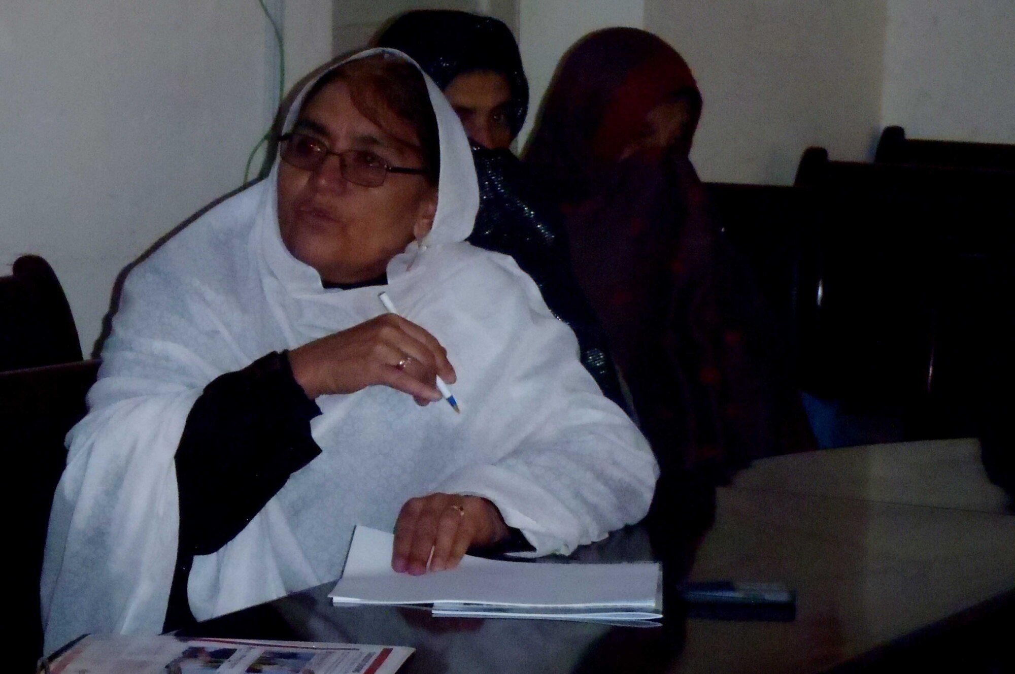 Khalema Khazan, Paktya Director of Women’s Affairs, takes notes during first-aid training at the women’s development center in Paktya Province, Afghanistan, Nov 1, 2011. The training included lessons on proper hygiene and treatment of burns, lacerations and abrasions. (Photo by Army Maj. Katherine Williams)