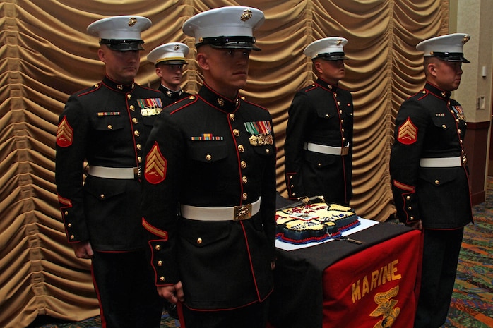 Recruiters from various offices prepare to march past the Honor Guard during the Recruiting Station Twin Cities 236th Marine Corps Birthday celebration Nov. 4. The first piece of cake was presented to the oldest and yougest Marines present. For additional imagery, visit www.facebook.com/rstwincities.