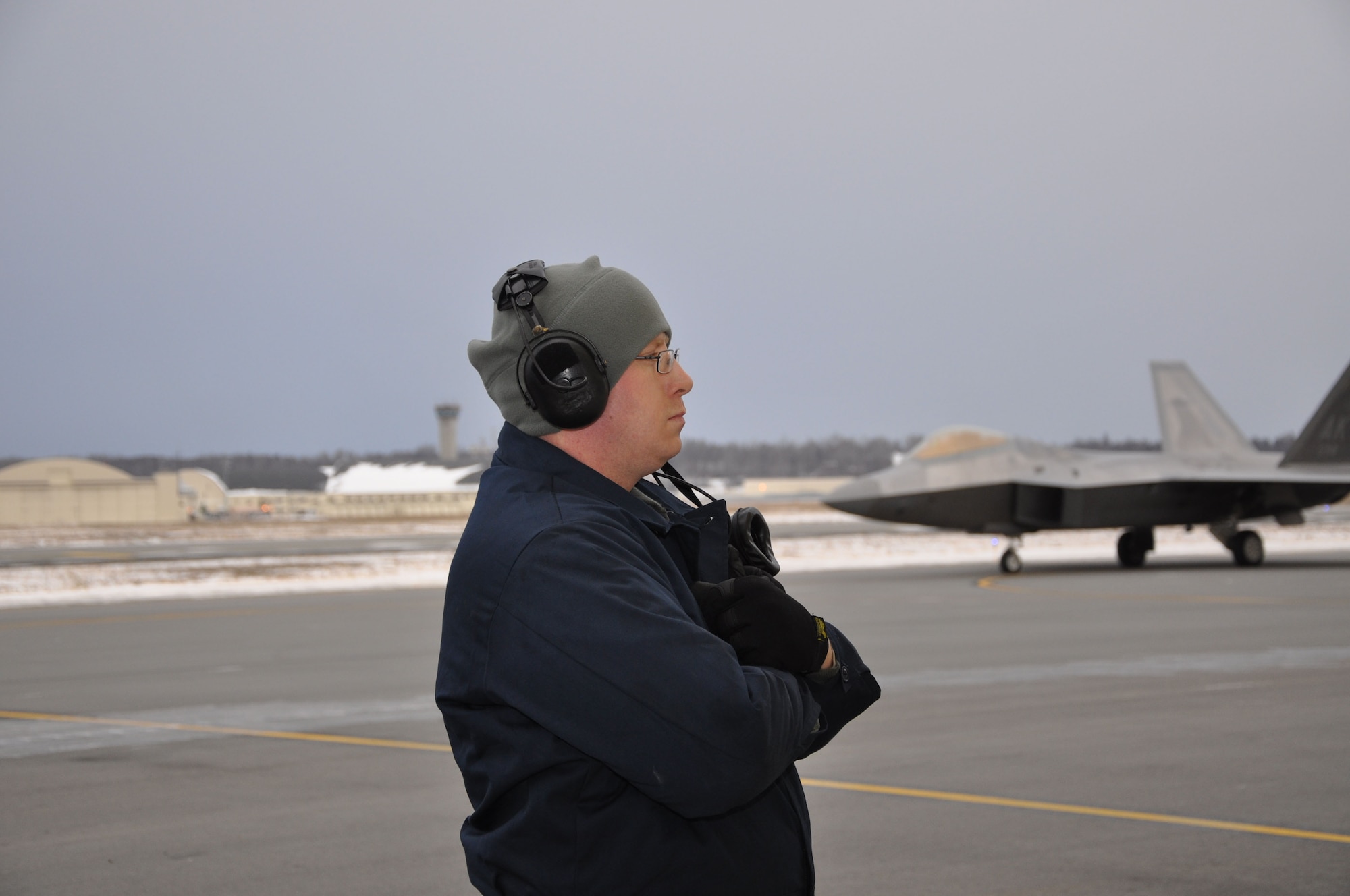 Aircraft Maintenance Squadron crew chief, prepares 302nd Fighter Squadron commander for take-off.