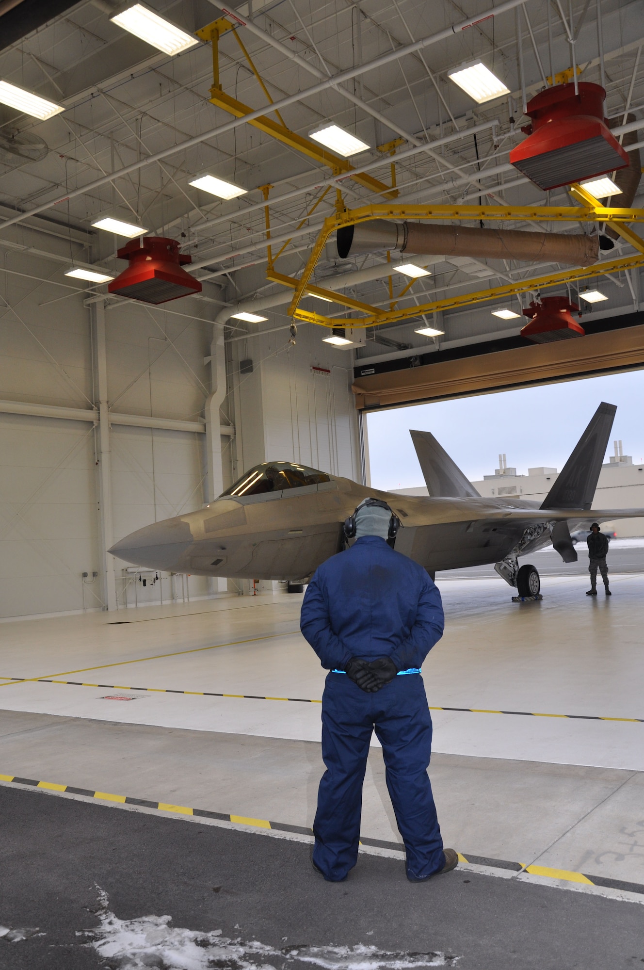 525th Aircraft Maintenance Squadron crew chief prepares302nd Fighter Squadron commander for take-off.