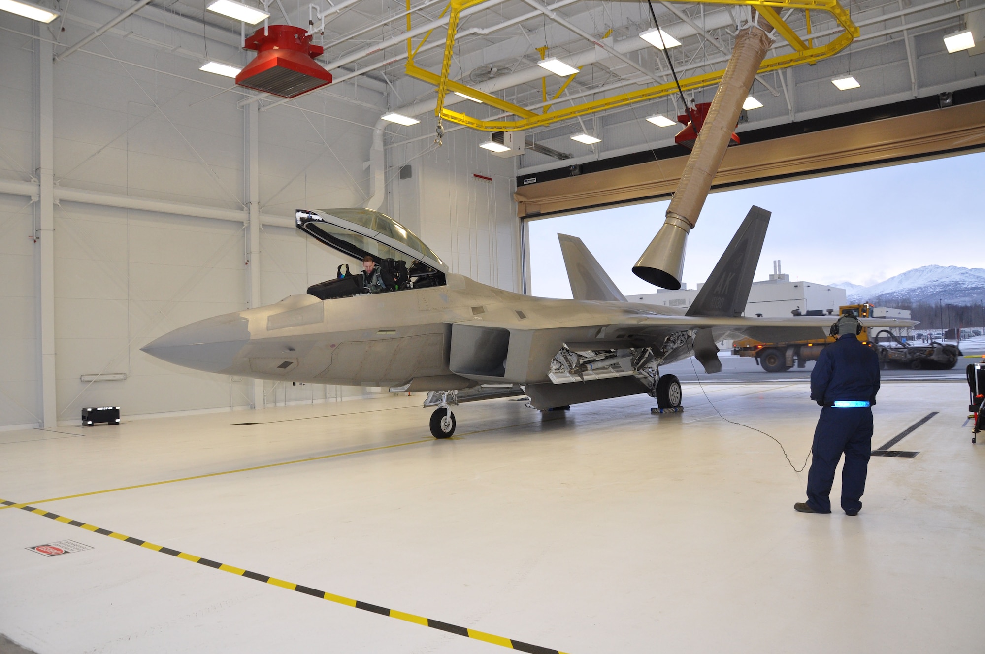 Aircraft Maintenance Squadron crew chief, prepares 302nd Fighter Squadron commander for take-off.