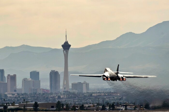 A U.S. Air Force B-1 Lancer assigned to the 77th Weapons Squadron departs for a training mission during the integrated tactics phase of the U.S. Air Force Weapons School Nov. 3, 2011, at Nellis Air Force Base, Nev. The 77th Weapons Squadron, part of the U.S.A.F.W.S., provides instructional flying and tactics training for students piloting the B-1 Lancer. (U.S. Air Force photo by Senior Airman Brett Clashman/Released)

