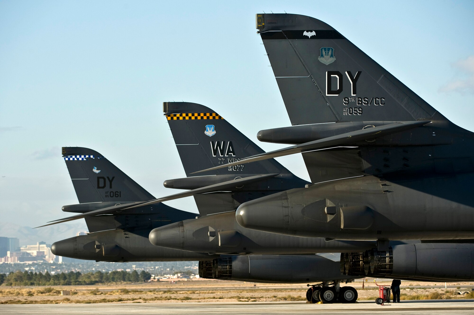 A 3-ship of U.S. Air Force B-1 Lancers assigned to the 77th Weapons Squadron sit on the Nellis Air Force Base flightline during the integrated tactics phase of the U.S. Air Force Weapons School Nov. 3, 2011, at Nellis AFB, Nev. The 77th Weapons Squadron, part of the U.S.A.F.W.S., provides instructional flying and tactics training for students piloting the B-1 Lancer. (U.S. Air Force photo by Senior Airman Brett Clashman/Released)

