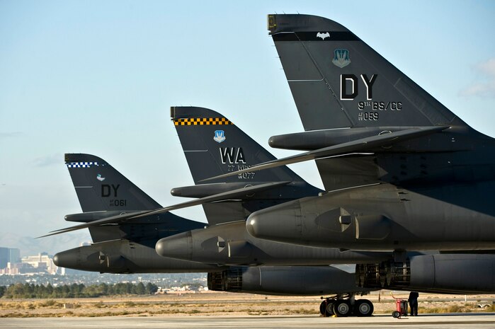 A 3-ship of U.S. Air Force B-1 Lancers assigned to the 77th Weapons Squadron sit on the Nellis Air Force Base flightline during the integrated tactics phase of the U.S. Air Force Weapons School Nov. 3, 2011, at Nellis AFB, Nev. The 77th Weapons Squadron, part of the U.S.A.F.W.S., provides instructional flying and tactics training for students piloting the B-1 Lancer. (U.S. Air Force photo by Senior Airman Brett Clashman/Released)