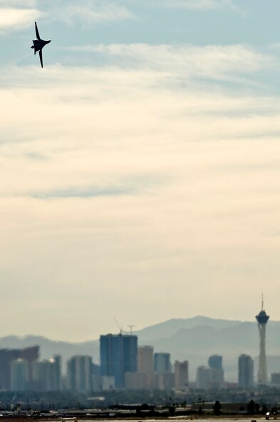 A U.S. Air Force B-1 Lancer assigned to the 77th Weapons Squadron departs for a training mission during the integrated tactics phase of the U.S. Air Force Weapons School Nov. 3, 2011, at Nellis Air Force Base, Nev. The 77th Weapons Squadron, part of the U.S.A.F.W.S., provides instructional flying and tactics training for students piloting the B-1 Lancer. (U.S. Air Force photo by Senior Airman Brett Clashman/Released)