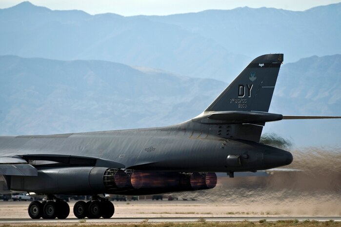 A U.S. Air Force B-1 Lancer assigned to the 77th Weapons Squadron departs for a training mission during the integrated tactics phase of the U.S. Air Force Weapons School Nov. 3, 2011, at Nellis Air Force Base, Nev. The 77th Weapons Squadron, part of the U.S.A.F.W.S., provides instructional flying and tactics training for students piloting the B-1 Lancer. (U.S. Air Force photo by Senior Airman Brett Clashman/Released)