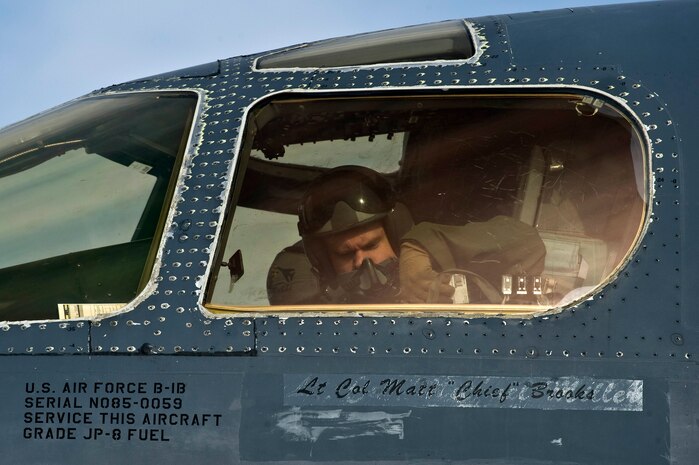 U.S. Air Force Lt. Col. Matt Brooks, B-1 Lancer pilot, 77th Weapons Squadron, performs pre-flight checks during the integrated tactics phase of the U.S. Air Force Weapons School Nov. 3, 2011, at Nellis Air Force Base, Nev. The 77th Weapons Squadron, part of the U.S.A.F.W.S., provide instructional flying and tactics training for students piloting the B-1 Lancer. (U.S. Air Force photo by Senior Airman Brett Clashman/Released)