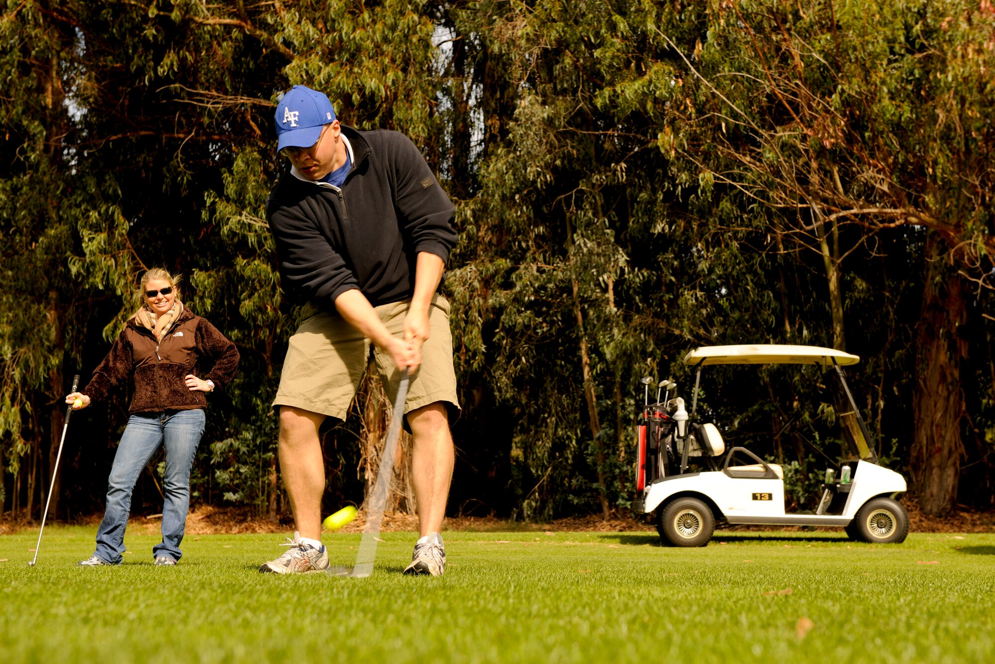 VANDENBERG AIR FORCE BASE, Calif. -- Capt. Jeremy Haas, from the 392nd Training Squadron, drives a ball to the green during a golf tournament hosted by members of Vandenberg's Commonwealth here Friday, Nov. 4, 2011. The event was a small gesture of appreciation for Vandenberg members for helping the Commonwealth personnel and their families feel welcome while thousands of miles away from their homeland. (U.S. Air Force/Staff Sgt. Levi Riendeau)