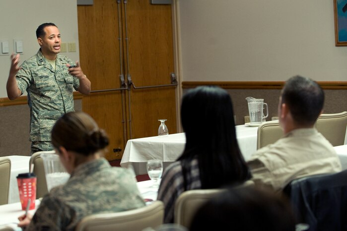 U.S. Air Force Capt. Jose Ortega, 99th Medical Operations Squadron resiliency element officer in charge, briefs at the Resilient Military Family Symposium Nov. 4, 2011, at Nellis Air Force Base, Nev. The symposium is designed to give family members the tools, knowledge, and resources to empower themselves to adapt to the rigors of the military environment. (U.S. Air Force photo by Staff Sgt. Christopher Hubenthal/Released)