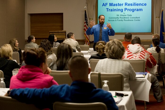 Wayne Ojala, 99th Force Support Squadron community readiness consultant, briefs at the Resilient Military Family Symposium Nov. 4, 2011, at Nellis Air Force Base, Nev. The symposium is designed to give family members the tools, knowledge, and resources to empower themselves to adapt to the rigors of the military environment. (U.S. Air Force photo by Staff Sgt. Christopher Hubenthal/Released)