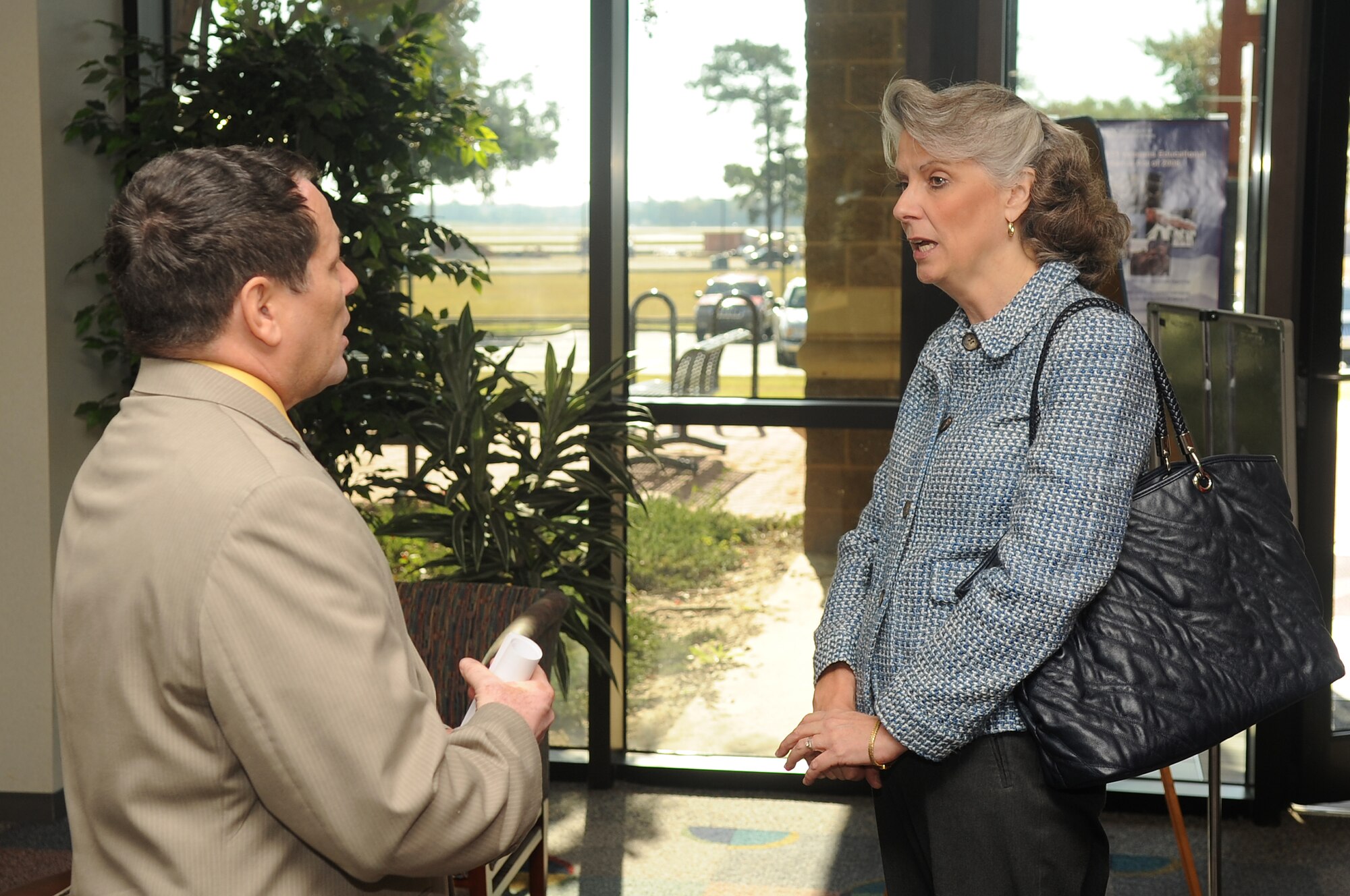 Mrs. Kathy Wells, wife of Maj. Gen. Lawrence Wells 9th Air Force commander, tours the Education Center at Shaw Air Force Base, S.C., Nov. 2, 2011. Wells and his wife visited multiple units on base to visit with Shaw Airmen and thank them for their hard work. (U.S. Air Force photo by Airman 1st Class Hunter Brady/Released)



