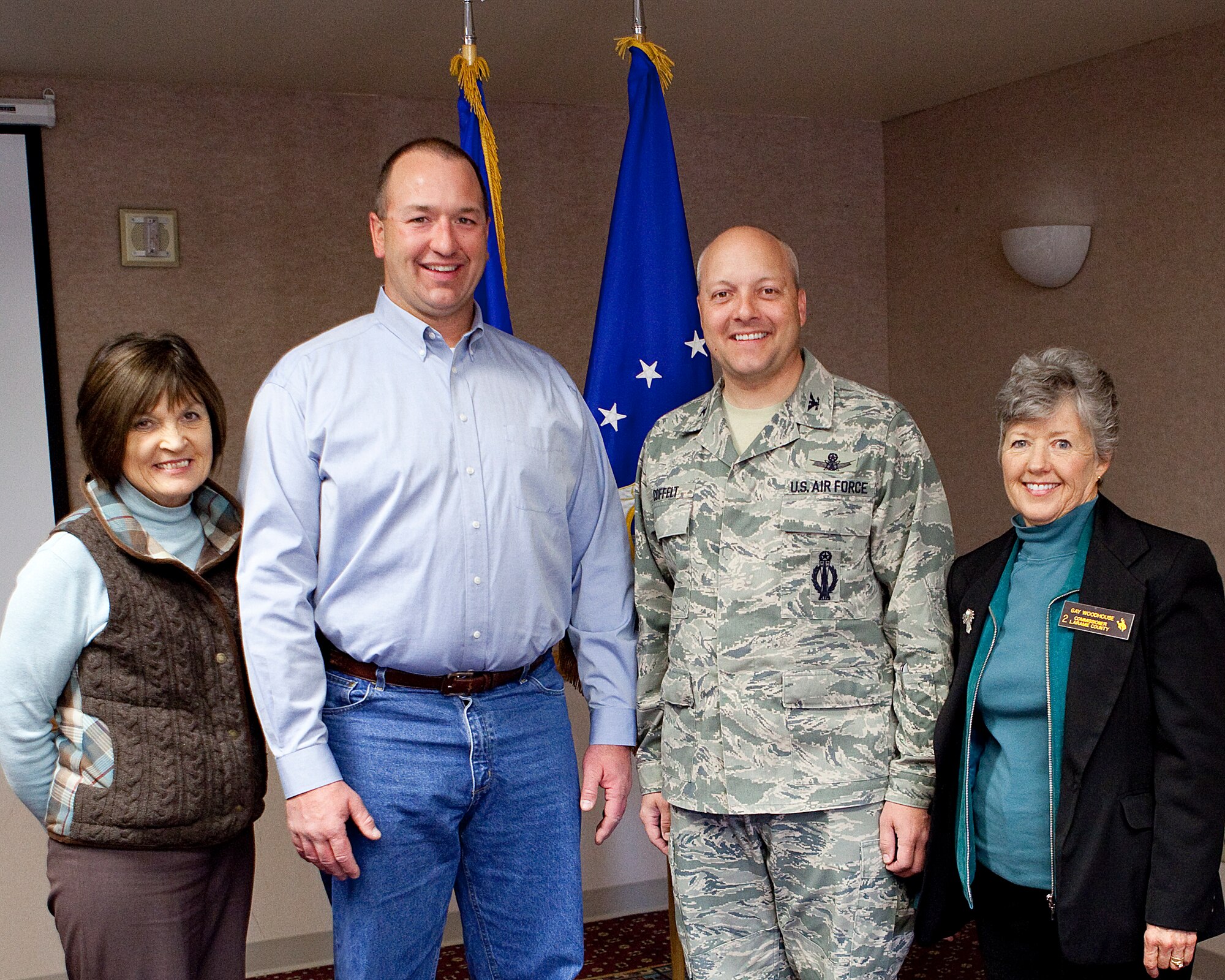 Col. Christopher “Boots” Coffelt, 90th Missile Wing commander, poses for a photograph with Laramie County Commissioners, Diane Humphrey, Dr. Troy Thompson and Gay Woodhouse, during the Laramie County Commissioners visit to F. E. Warren Air Force Base, Wyo., Oct. 25. (U.S. Air Force photo by Matt Bilden)