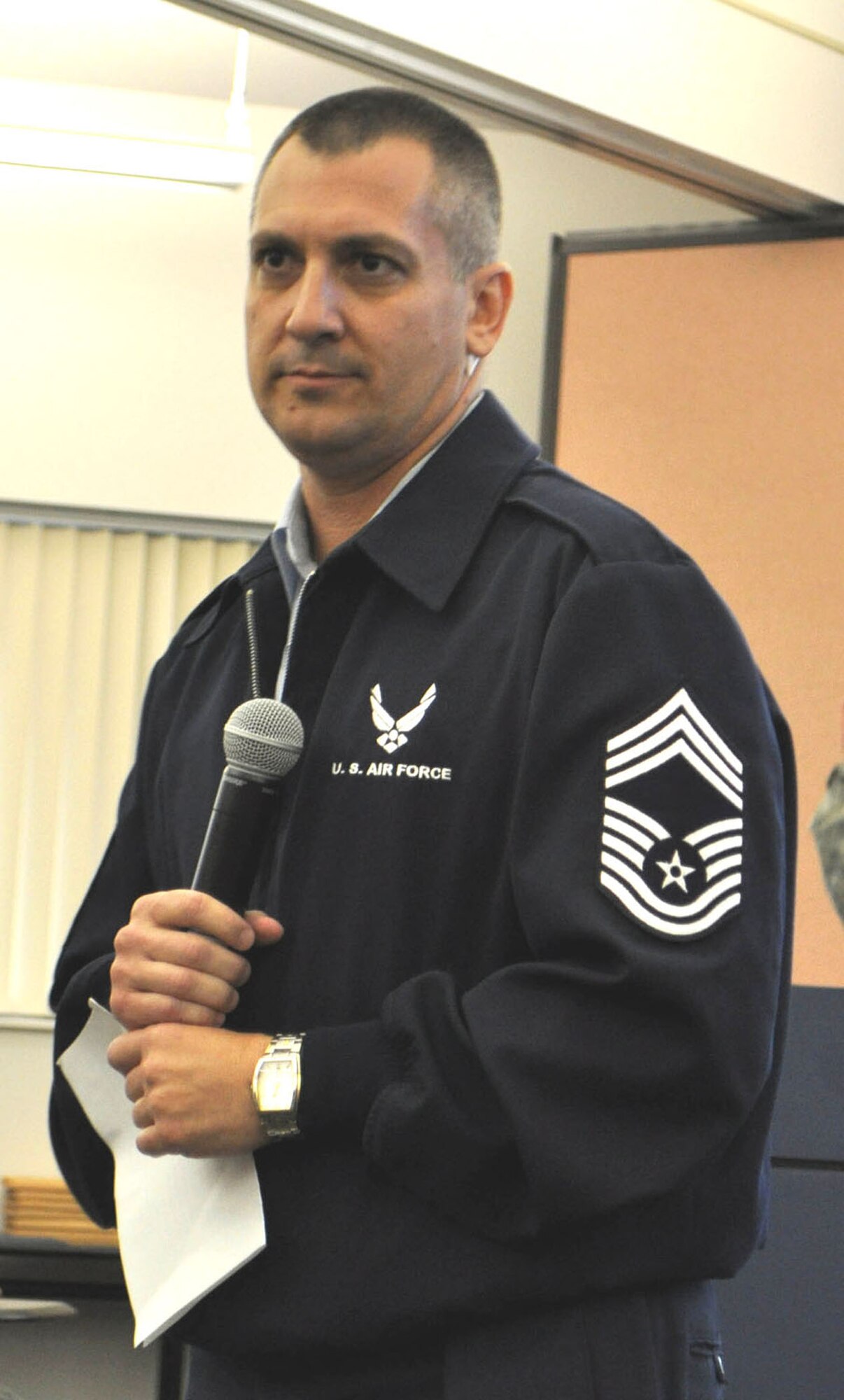 TRAVIS AIR FORCE BASE, Calif. -- During the 2011 349th Air Mobility Wing Enlisted Workshop, a special presentation was made by Chief Master Sgt. Jim Henley, pictured. Listening intently in the background is 349th AMW Command Chief Master Sgt. Kathleen Buckner, as Chief Henley addresses having your affairs in order for your family. The chief lost his battle to a virulent cancer, on Oct 29.  The chief talked specifically about preparations for minor children, living wills, trusts, SGLI, working with the Veterans Administration and more. (U.S. Air Force photo/Senior Master Sgt. Ellen L Hatfield)