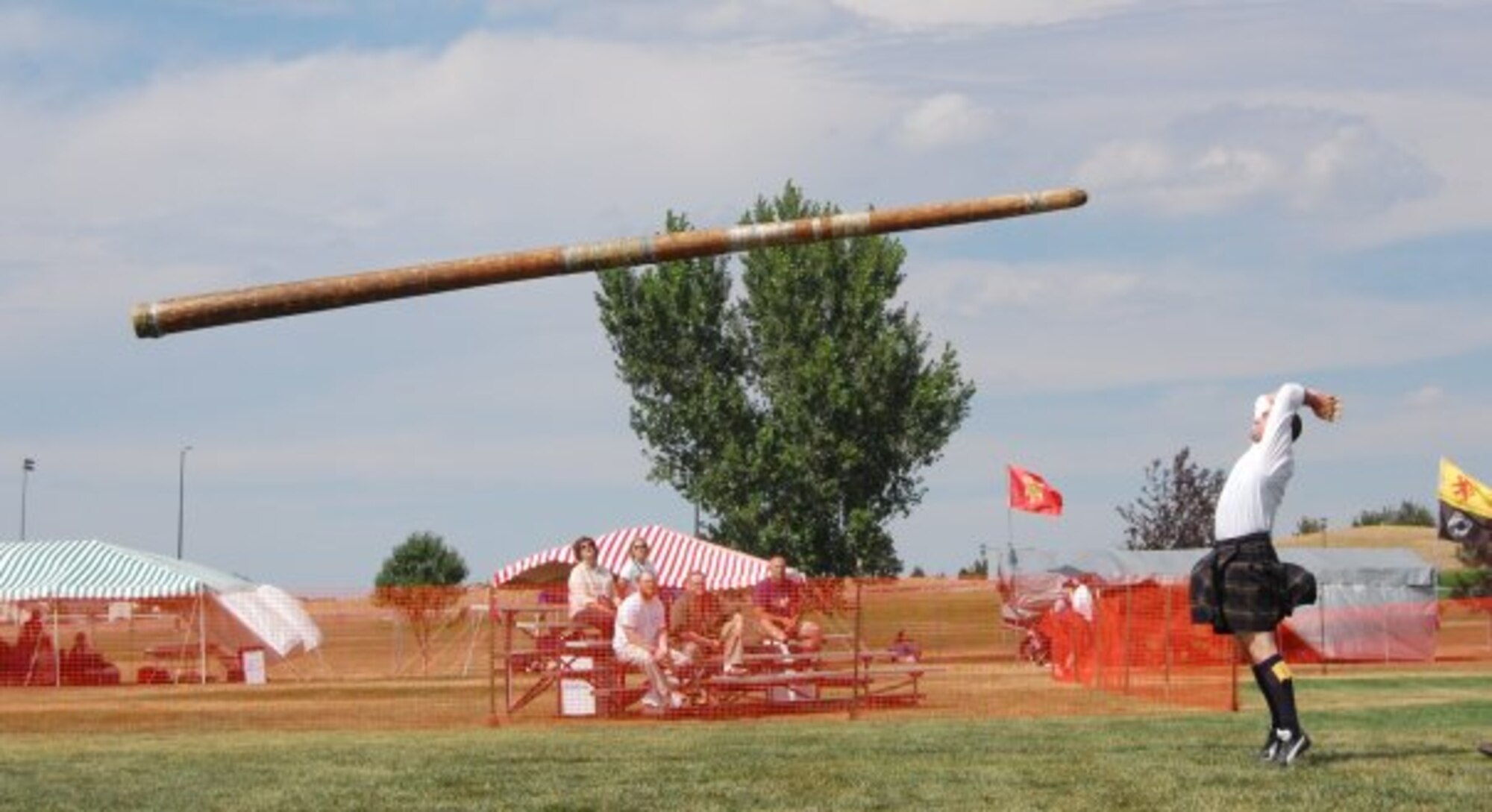 VANDENBERG AIR FORCE BASE, Calif. – Jonathan Low, the 30th Medical Operations Squadron’s Health and Wellness Center health promotion program manager, tosses a large object while participating in the Scottish Highland Games in Colorado in 2009. (Courtesy photo) 