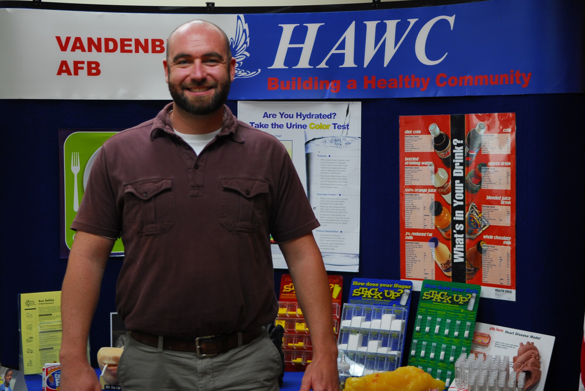 VANDENBERG AIR FORCE BASE, Calif. – Jonathan Low, the 30th Medical Operations Squadron’s Health and Wellness Center health promotion program manager, stands in front of an informational poster board in a classroom at the HAWC Wednesday, Nov. 2, 2011. (U.S. Air Force photo/Senior Airman Steve Bauer) 