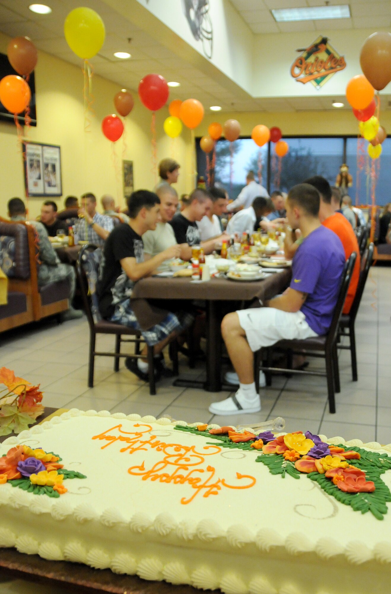 Students enjoy a monthly birthday dinner Nov. 2, 2011, at Magnolia Dining Facility, Keesler Air force Base, Miss. The monthly birthday celebrations are for both permanent party and technical training students and they are served a free meal by dining hall employees and senior enlisted members.  (U.S. Air Force photo by Kemberly Groue)