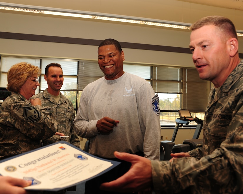 Senior Master Sgt. Nathaniel Hawkins is notified by base leadership that he is one of five individuals at Joint Base Charleston to make Chief Master Sgt., on Nov. 2, 2011. Hawkins is the fuels management flight superintendent with the 628th Logistics Readiness Squadron. (U.S. Air Force photo/Staff Sgt. Katie Gieratz)(Released)