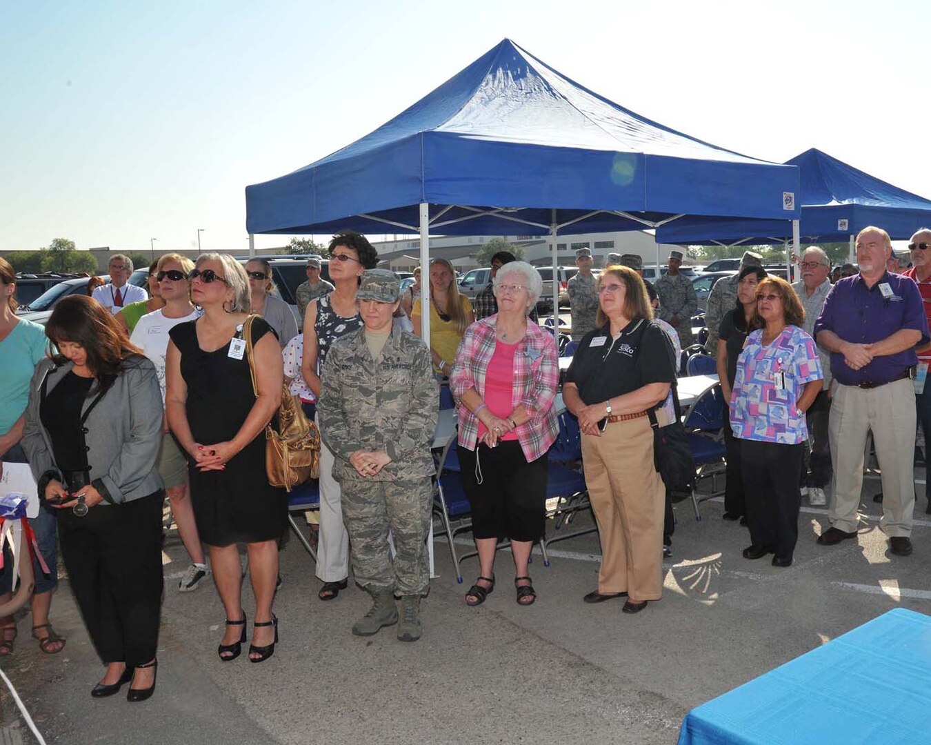 Patrons wait patiently for the grand opening of the One Stop facility Sept. 28. (U.S. Air Force photo/Alan Boedeker)