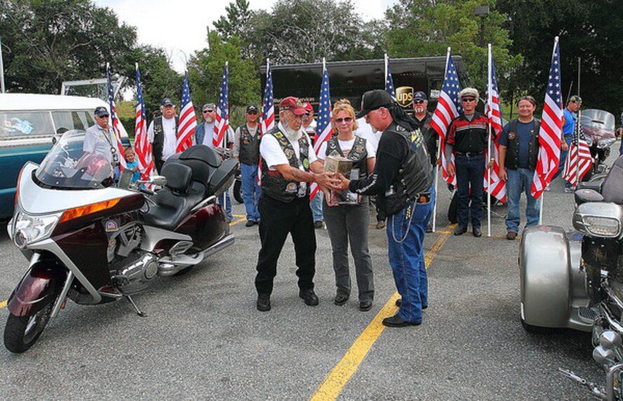 Retired U.S. Air Force Master Sgt. Jerry Childs stands position in respect of a fallen member of the Patriot Guard Riders July 9, 2011. The man’s daughter requested he be taken on his “last ride,” where other PGR members passed his remains from Florida to Kentucky where his family lived. Childs joined the group at the beginning of this year, and said he is passionate about the services he participates in with the group. (Courtesy Photo)