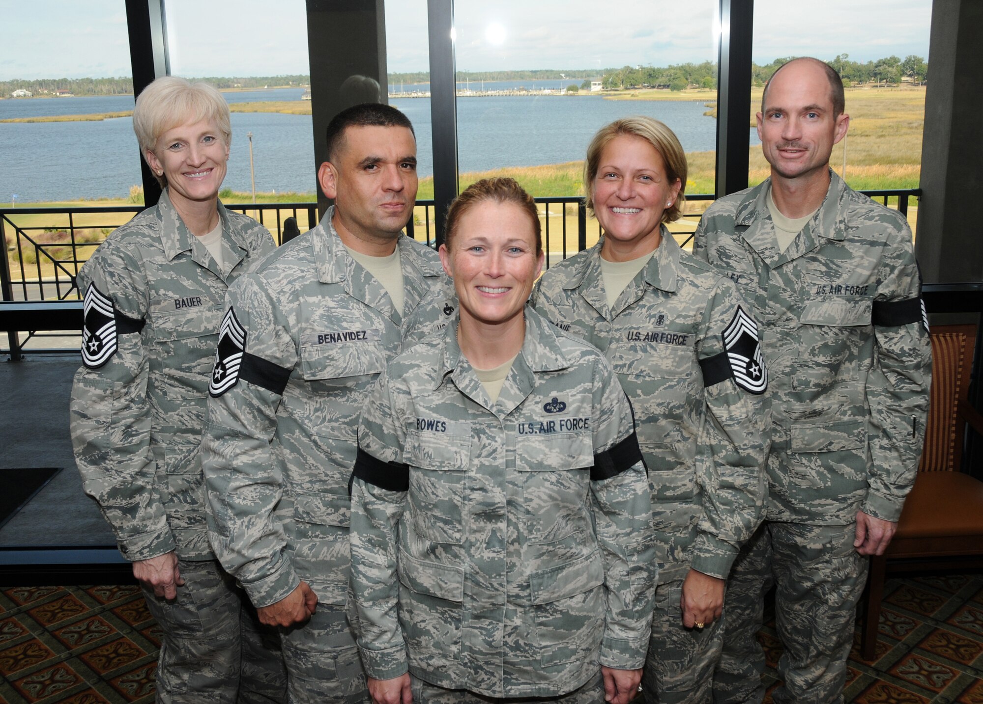 Keesler’s newest Chief Master Sgts. take a photo during their promotion party at the Bay Breeze Events Center , Keesler Air Force Base, Miss., Nov. 3, 2011.  They are listed from left to right, Senior Master Sgts. Kimberlee Bauer, 81 Training Wing; Juan Benavidez, 81st Logistics Readiness Squadron; Sherry Bowes, 2nd Air Force; Melanie Dolzanie, 81st Medical Support Squadron; and Kevin Endsley, 81st Training Wing.  (U.S. Air Force photo by Kemberly Groue)