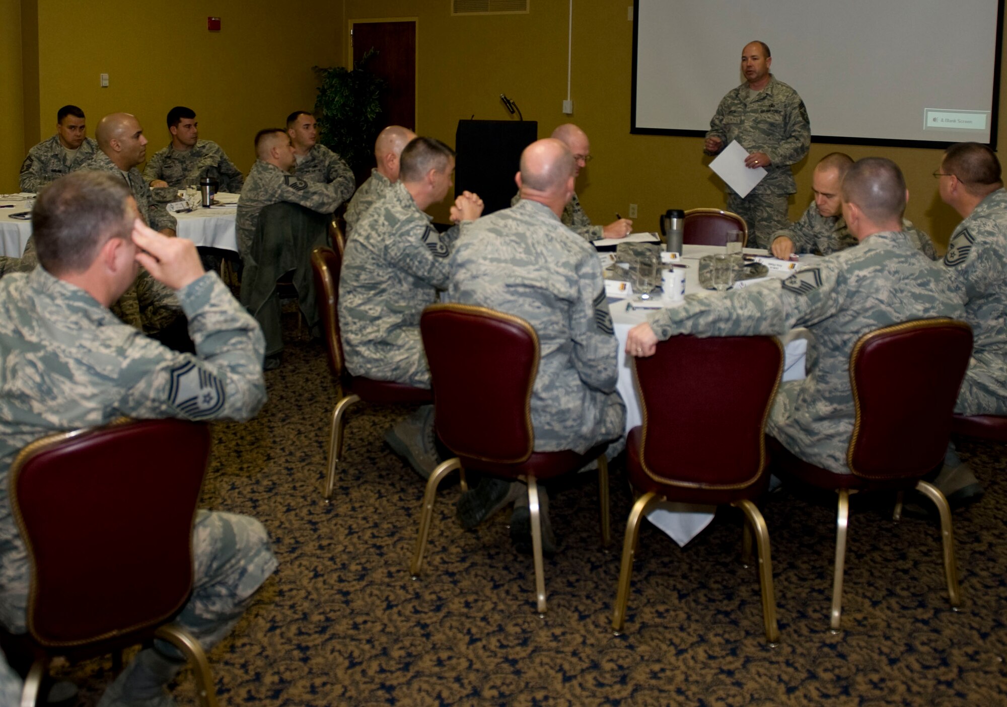 Chief Master Sgt. Brian Lavoie, 28th Bomb Wing Command Chief, speaks to fellow Airmen at a senior NCO colloquium in the Dakota’s Enlisted Club on Ellsworth Air Force Base, S.D., Nov. 1, 2011. Speakers from various organizations around the base provided information and ideas to the senior NCO’s to provide them the tools needed to become more effective leaders. (U.S. Air Force photo by Airman 1st Class Kate Thornton/Released)