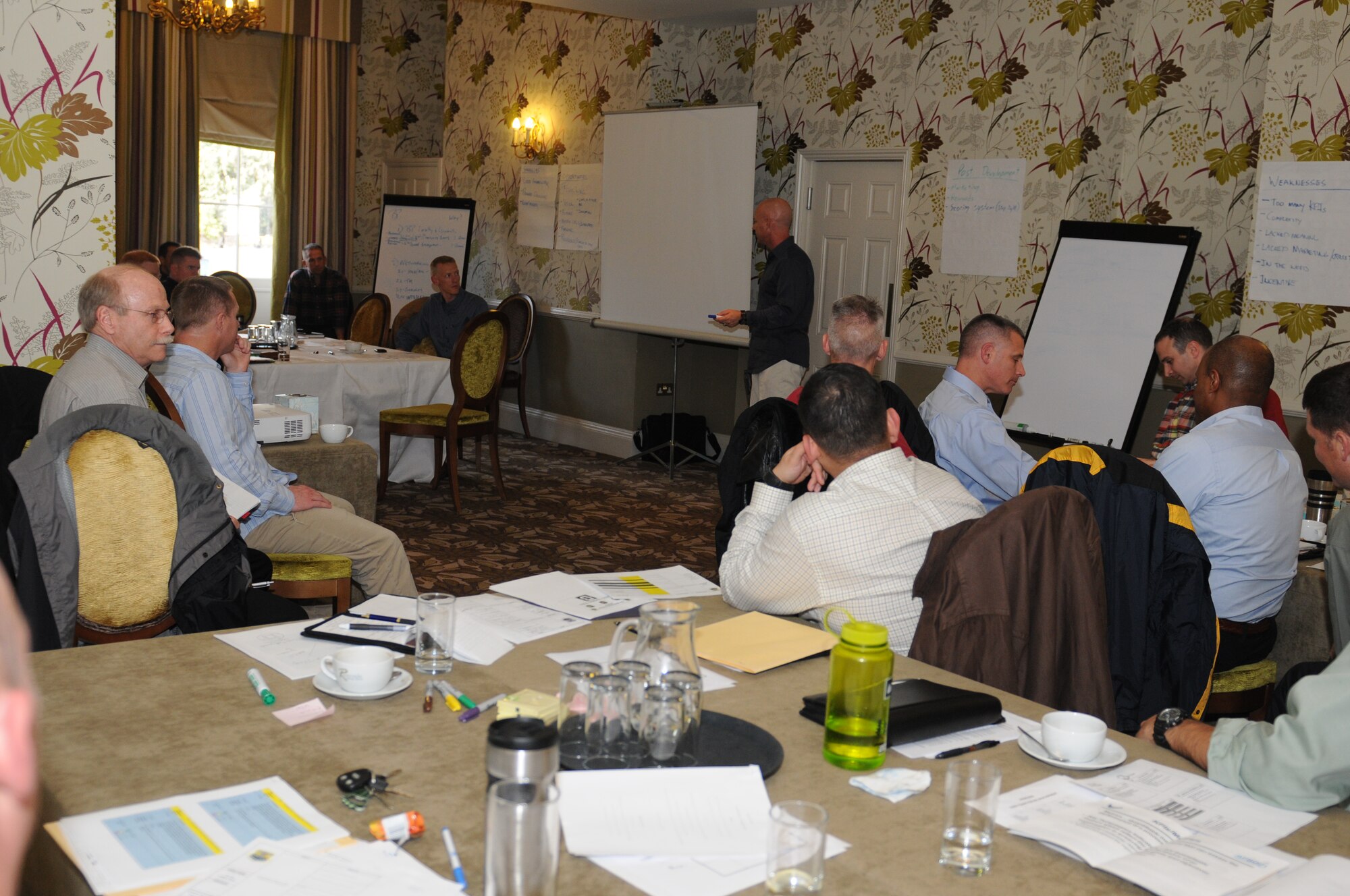 MILDENHALL VILLAGE, England – Leadership from across the 100th Air Refueling Wing met for a Strategic Alignment and Development Plan, a practice used in the military, civilian industry and corporate world to establish overarching themes and goals, Oct. 25, 2011. Mission, people and building partnerships were the three established base priorities and eight new objectives were formulated for RAF Mildenhall in 2012. Over the course of the year, the objectives will be used to gauge whether the wing mission is being successfully accomplished. (U.S. Air Force photo/Staff Sgt. Tabitha Lee)