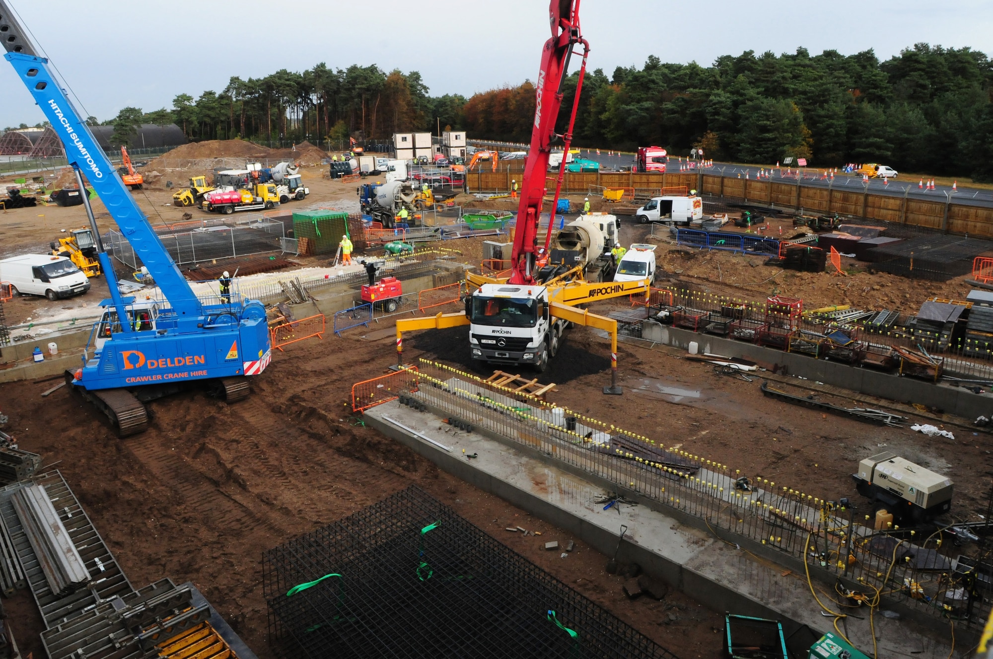 ROYAL AIR FORCE LAKENHEATH, England - Construction continues at a new gate for heavy goods vehicles Nov. 4, 2011. The new gate will help ease congestion around Lakenheath's main gate and is estimated to be completed by August 2012. (U.S. Air Force photo by Senior Airman Lausanne Morgan)