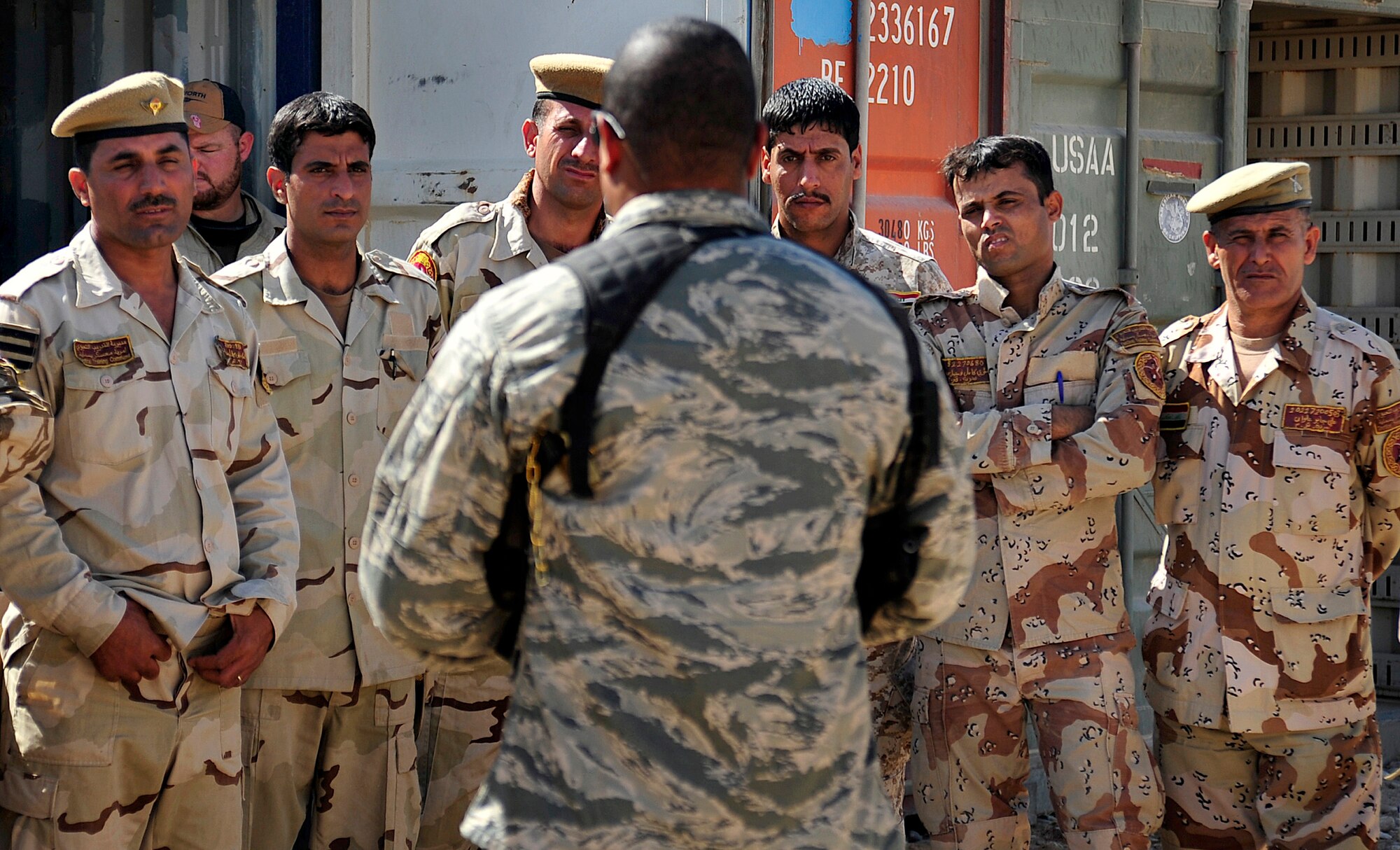 Tech. Sgt. Chermone Bunting, a combat munitions advisor with the Iraq Training and Advisory Mission- Army, reviews lessons learned during a munitions training class with Iraqi Army soldiers Oct. 10, 2011 in Besmaya, Iraq. Bunting is deployed from Sheppard Air Force Base, Texas, and is from Passaic, N. J. (U.S. Air Force photo/Master Sgt. Cecilio Ricardo)