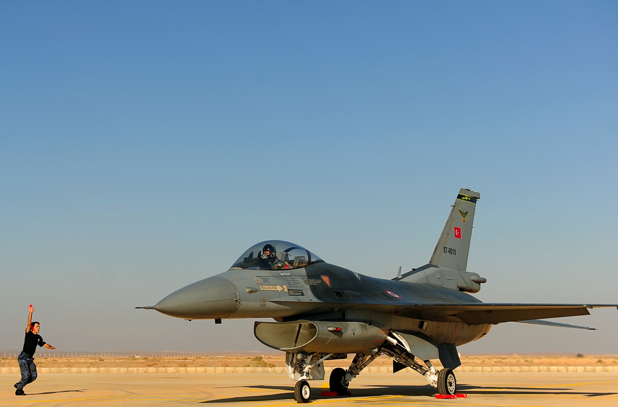 Turkish air force maintainers participate in the scramble competition in support of the Falcon Air Meet 2011, Oct. 19, 2011. FAM is a multi-national exercise and operational activity in Jordan to enhance regional partnerships and interoperability as well as demonstrate U.S. commitment to regional security and stability. (U.S. Air Force photo/Senior Airman Asha Kin)