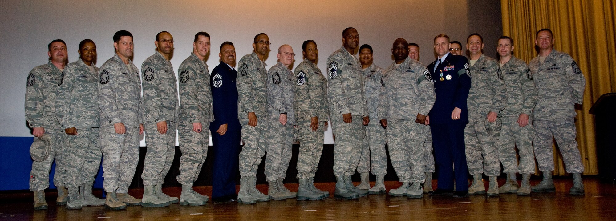 YOKOTA AIR BASE, Japan -- Yokota's Chiefs Group pose for a picture with its newest chief master sergeant selects during a chief master sergeants social at Yokota Air Bsse, Japan, Nov. 3, 2011. Five chief master sergeant selects were chosen from Yokota. (U.S. Air Force photo/Airman 1st Class Krystal M. Garrett)

