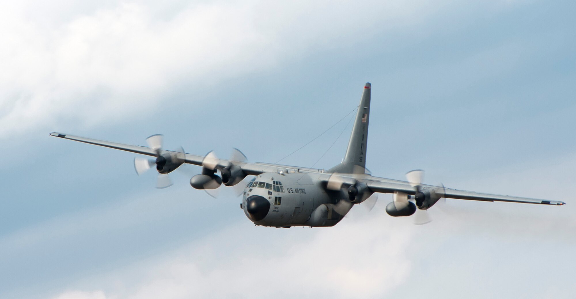 OVER JAPAN -- A C-130 Hercules flies a training mission near Mount Fuji, Japan, Nov. 2, 2011. Six C-130s flew in formation to practice different types of air drops in what the 374th Airlift Wing calls a Samurai Surge. (U.S. Air Force photo/Staff Sgt. Samuel Morse)